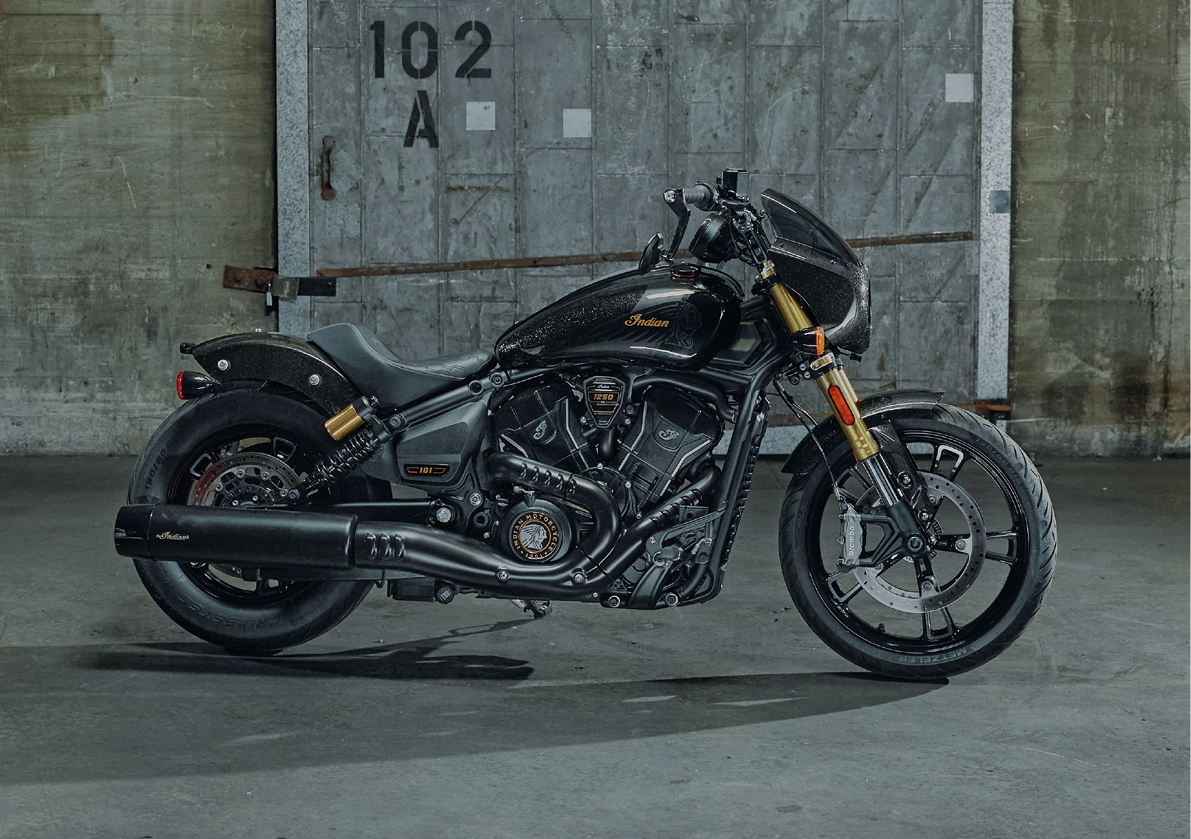 A black motorcycle is parked in a garage. AI generated content